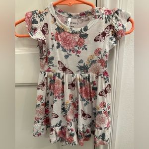 Posh Peanut Floral White Ruffled Baby
Bodysuit Dress | Constance (print)